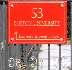 sign:entrance around corner